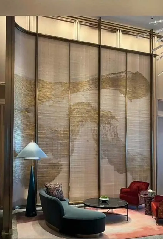 Lounge with a backlit patterned screen and floor lamps