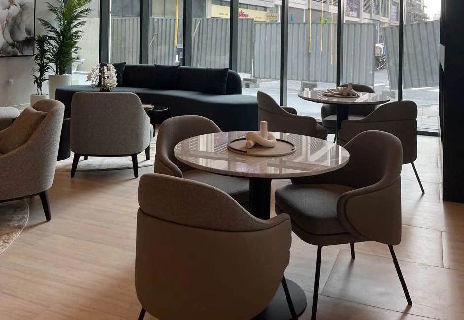 Dining chairs, round tables and lounge seating