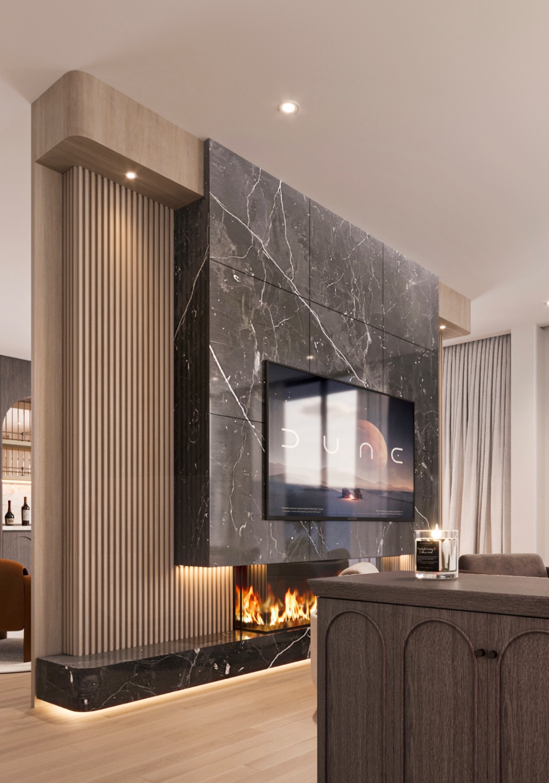 Recessed television framed by dark veined marble, fluted timber and an integrated fireplace