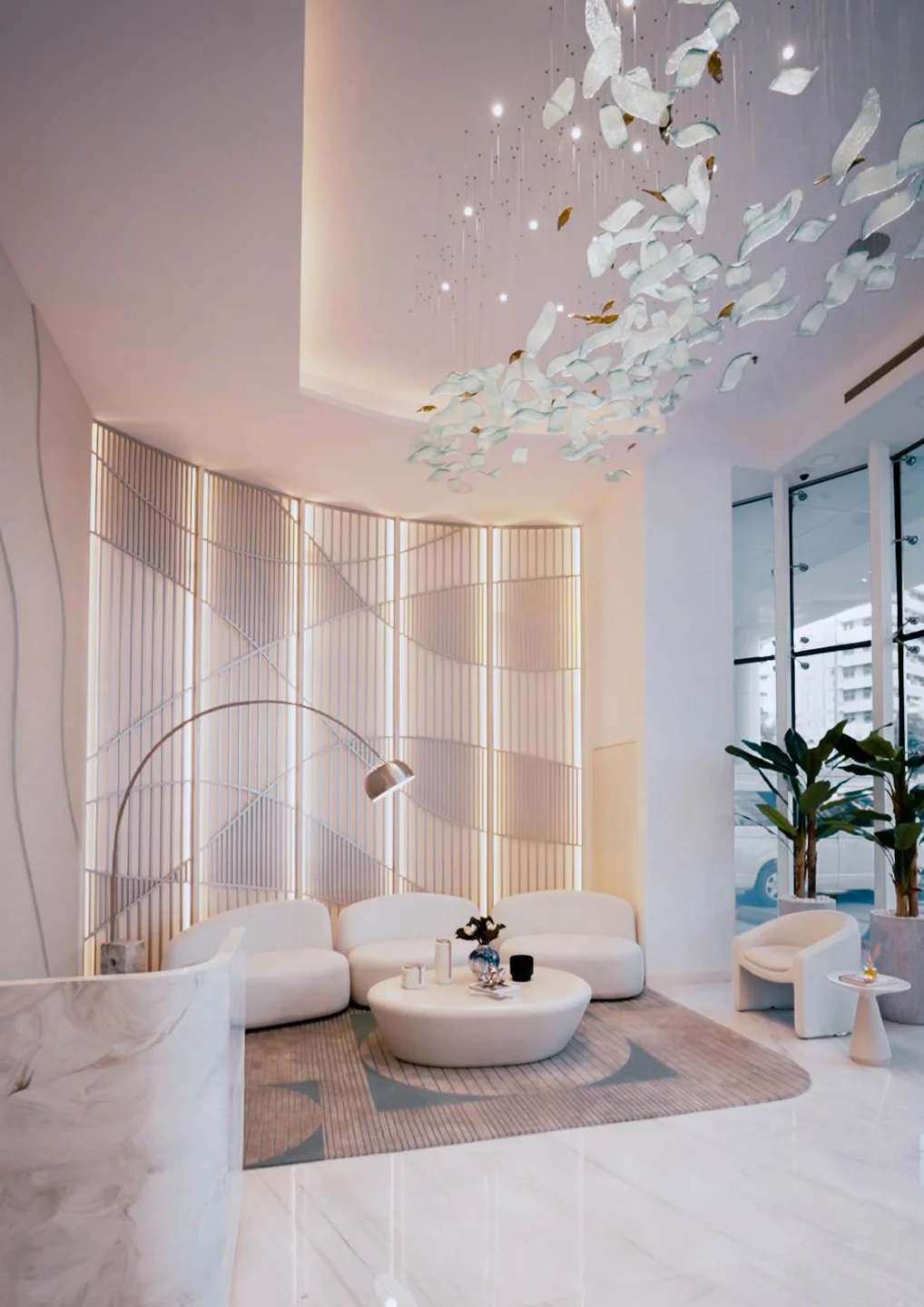Curved lounge seating and a low table beside a fitted wall