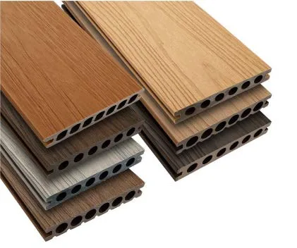 Co-extruded composite decking boards in several timber tones
