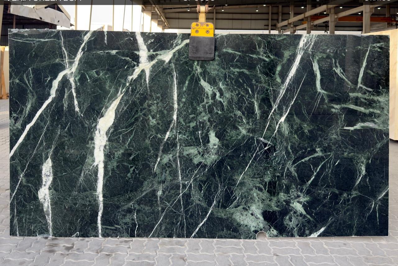 Deep green stone with bold white veining
