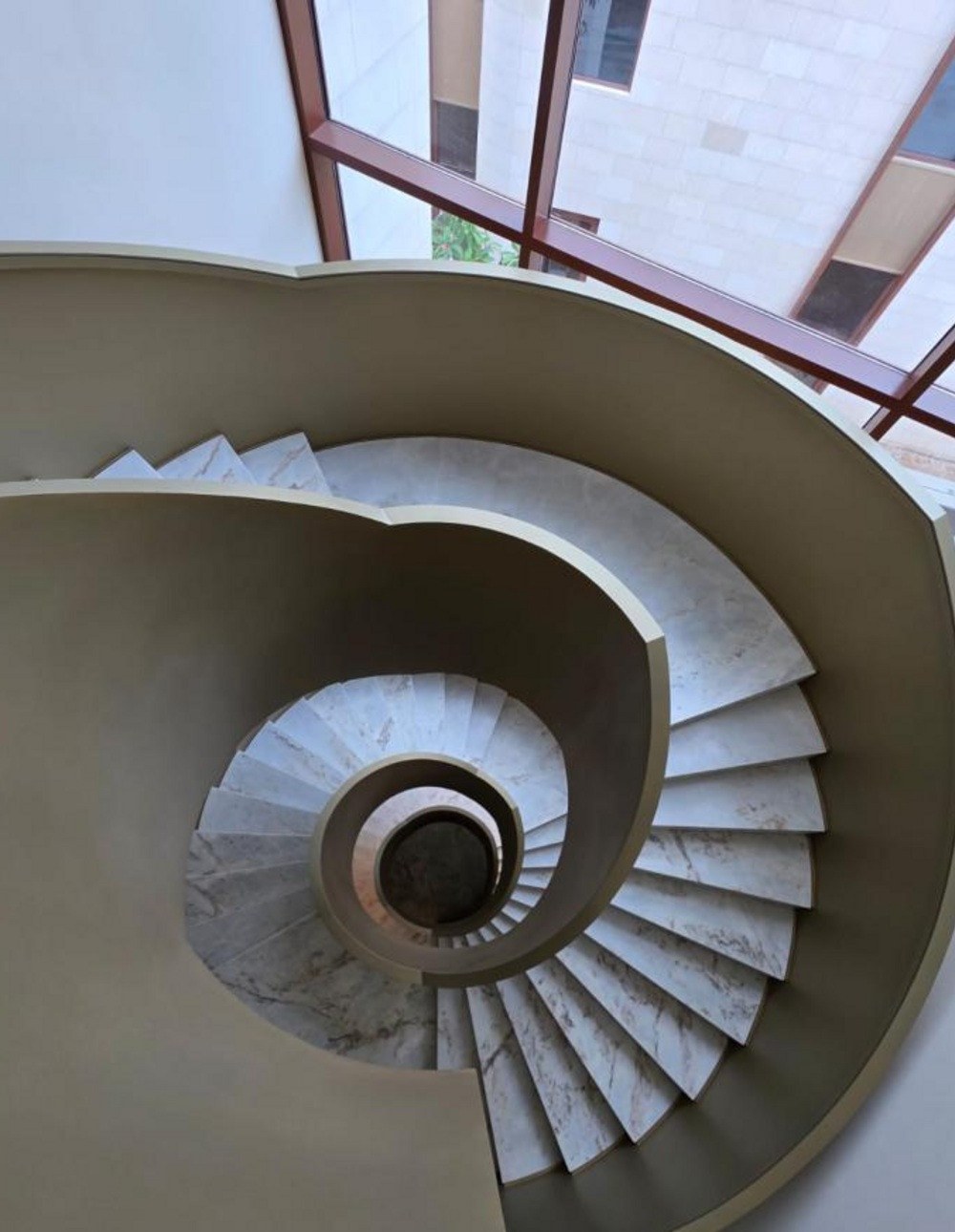Reference image of a marble spiral stair seen from above
