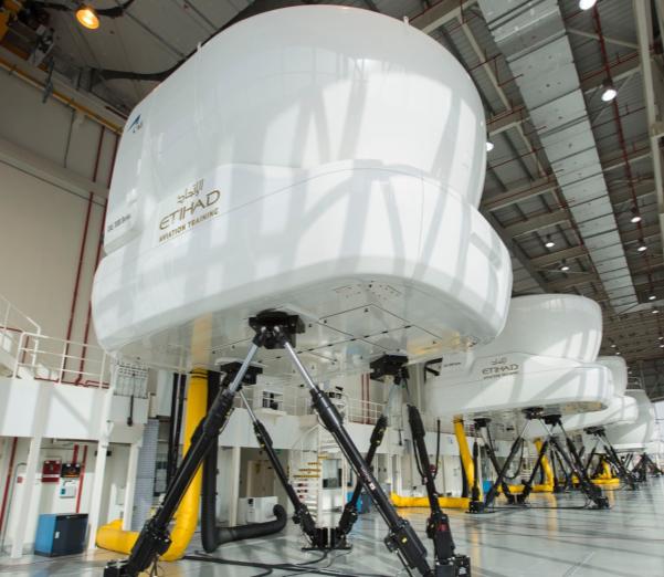Full-motion flight simulator installed inside the training hall