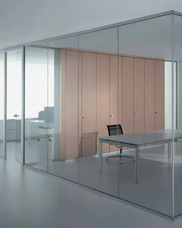 Internal glazed office partition with a timber-panelled meeting room behind